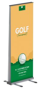 A double-sided outdoor banner stand promoting a golf tournament.